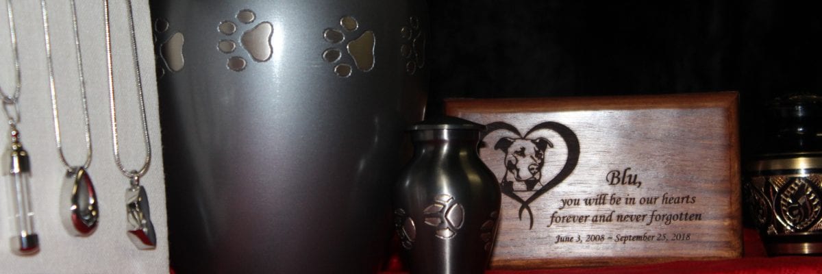 group of dog urns and keepsakes